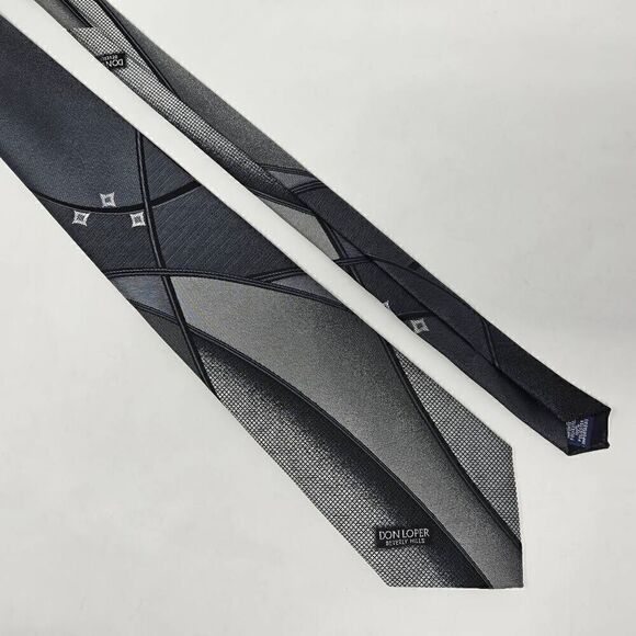 DON LOPER BEVERLY HILLS VINTAGE POLY TIE BLACK SILVER LOGO ABSTRACT 4" X 57" - Picture 1 of 3